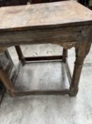 SMALL JOINED OAK OCCASIONAL TABLE, later square top, on turned column legs joined by peripheral