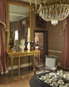 GEORGE III GILTWOOD SERVING TABLE, later simulated sienna marble painted top, frieze moulded with