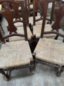 SET OF SIX CONTINENTAL RUSH SEATED DINING CHAIRS, with baluster splats and turned stretchers, 101cms