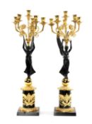 PAIR EMPIRE STYLE PARCEL GILT BRONZE CANDELABRA, five acanthus scrolled branches supported by winged