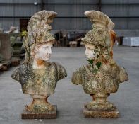 PAIR OF PAINTED CAST IRON BUSTS OF GREEK WARRIORS wearing plumed helmets and armour, on socle
