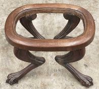 19TH C. FRENCH ROSEWOOD & MAHOGANY OVAL DRESSING STOOL, supported on carved lion's paw legs, 37 (