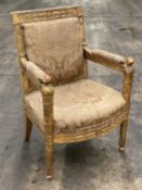 ITALIAN EMPIRE GILTWOOD ARMCHAIR, c. 1815, with square back, bowed front seat, and turned uprights