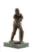 THE CRICKET CLUB HOUSE: COLD CAST BRONZE SCULPTURE OF W. G. GRACE, on green marble plinth, 29.