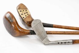 THE GOLF CLUB HOUSE: THREE HICKORY SHAFTED CLUBS, first bearing the name D. Anderson & Sons, St