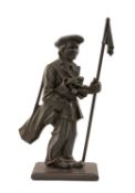 THE GOLF CLUB HOUSE: NOVELTY PATINATED METAL FIRESIDE COMPANION, modelled as a caddy holding pin