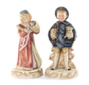 RARE PAIR OF GEBRÜDER HEUBACH BISQUE PORCELAIN FIGURES, from the Pet Series, 'Boy with Pugs'