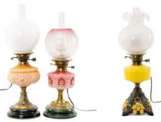 THREE OIL LAMPS including ATTRACTIVE YELLOW & CAST METAL OIL LAMP with opaque glass shade