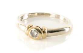9CT WHITE & YELLOW GOLD DIAMOND RING, rub over setting, 0.15cts approx., ring size M, 2.3gms