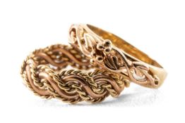 TWO CLOGAU 9CT GOLD RINGS, comprising Tree of Life and rope twist designs, 5.5gms gross in vintage