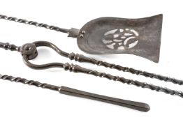 GOOD SET GEORGE IV STEEL FIRE IRONS, twisted stems, octagonal baluster columns, 76.5cms (3)