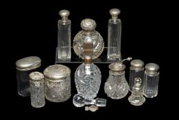 ASSORTED SILVER MOUNTED DRESSING TABLE BOTTLES & JARS, including two cut-glass atomisers