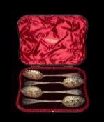 BOX SET OF FIVE VICTORIAN SILVER GILT BERRY SPOONS, Wakely & Wheeler, London 1893, floral engraved