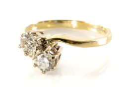 18CT YELLOW GOLD TWO STONE DIAMOND RING, twist shank, claw set, 0.45cts overall approx., ring size L