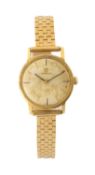 9CT GOLD OMEGA LADIES' WRISTWATCH, manual wind movement, champagne dial (degraded), baton markers