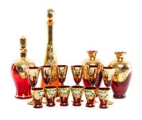 VENETIAN FLORAL ENAMELLED GILT GLASSWARE, comprising two decanters, pair of vases