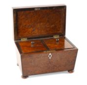 19TH C. BURR YEW TEA CADDY, c. 1840, sarcophagus form with two internal compartments, bun feet