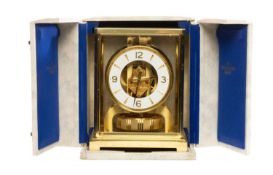 JAEGER LECOULTRE 'ATMOS' CLOCK, Classic V, brass dial with white chapter ring bearing Arabic