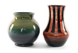 TWO MOORCROFT TRIAL VASES, one ribbed spherical form, painted in blue/green ombre