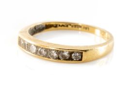 18CT GOLD SEVEN STONE DIAMOND RING, 0.33cts overall approx., ring size K, 2.6gms