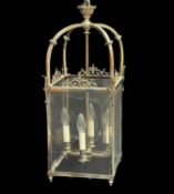 BRASS FRAMED 4-GLASS HALL LANTERN, c. 1900, with scrolled ornament, and bowed, knopped square