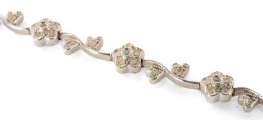 DIAMOND & WHITE GOLD FLORAL NECKLACE, flower head and leaf links, with silver clasp stamped '925'