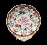 SWANSEA DESSERT DISH circa 1815-17, of shell form with the fan handle picked out in gold