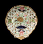 SWANSEA DESSERT DISH circa 1815-17, of shell form with the fan handle solid gilt, painted in set