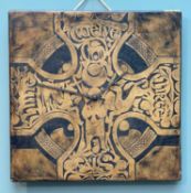 JOHN CLEAL FOR 'WORKSHOP WALES UNIQUE CLOCKS', leather and hardboard, tooled and scorched Celtic