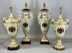 TWO PAIRS OF CHINESE STYLE PORCELAIN ARMORIAL TABLE LAMPS, on wooden bases, 52cms (h) and 50cms (