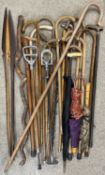 COLLECTION OF VINTAGE WALKING STICKS, shooting sticks, umbrellas, and other items Provenance: