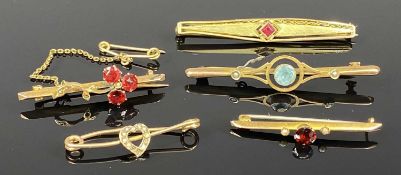 TWO 9CT GOLD STONE SET BAR BROOCHES, and three unmarked yellow metal bar brooches Provenance: