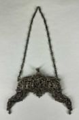 CONTINENTAL WHITE METAL HINGED PURSE MOUNT, one side ornately pierced and chased with cherubs