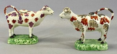 EARLY 19TH CENTURY SWANSEA POTTERY COW CREAMERS, with covers, painted in purple and red lustre,
