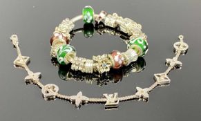 WHITE METAL BRACELET & CHARMS, stamped 'Pandora', with fourteen various charms, and white metal