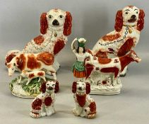 PAIR STAFFORDSHIRE RUSSET & CREAM SEATED SPANIELS, 19th century, 33cms (h), similar smaller pair
