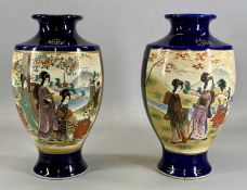 PAIR OF JAPANESE SATSUMA BALUSTER VASES, each decorated with panels of figures and blossom, on a