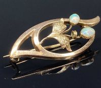 9CT ROSE GOLD FLORAL BROOCH set with two opals, 35mms, 1.5gms Provenance: private collection Conwy