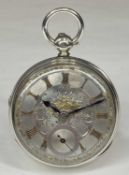 GEORGE V SILVER-CASED POCKET WATCH, keyless, ornate dial with raised gold Roman numerals and