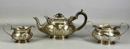 EDWARD VII SILVER THREE-PIECE TEA SERVICE, oval form with gadrooned decoration, Birmingham 1908,