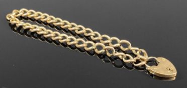 9CT GOLD CURB LINK BRACELET with heart shaped locket, 19cms (l), 8gms Provenance: deceased estate