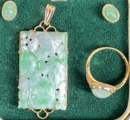 JADEITE JEWELLERY, Chinese rectangular jadeite pendant, pierced and carved, in 9ct gold mount