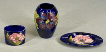 BLUE ANEMONE BALUSTER VASE, 14.5cms (h), pink magnolia oval ashtray, 17 x 10cms and an oval pot