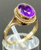 9CT OVAL AMETHYST RING with open shoulders, 12 x 10mms, size O, 3.1gms