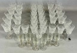 WATERFORD CRYSTAL, twenty-three 'Alana' wine glasses, thirteen smaller wine glasses, etc.