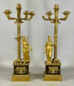 PAIR OF FRENCH EMPIRE STYLE ORMOLU FIVE-LIGHT FIGURAL CANDELABRAS, four scroll branches