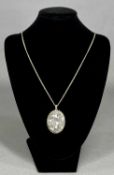 VICTORIAN STYLE LARGE SILVER OVAL LOCKET & CHAIN engraved with floral design and with rope edging