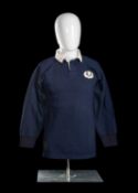 I S G SMITH | SCOTLAND | c.1970 The jersey in navy blue with white collar, stitched Scottish thistle