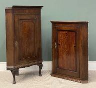 TWO ANTIQUE OAK CORNER CUPBOARDS, one on cabriole supports, 126 (h) x 79 (w) x 47cms (d)