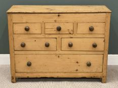 ANTIQUE PINE LIFT-LID CHEST, with three blind drawers over two small and one long drawer
